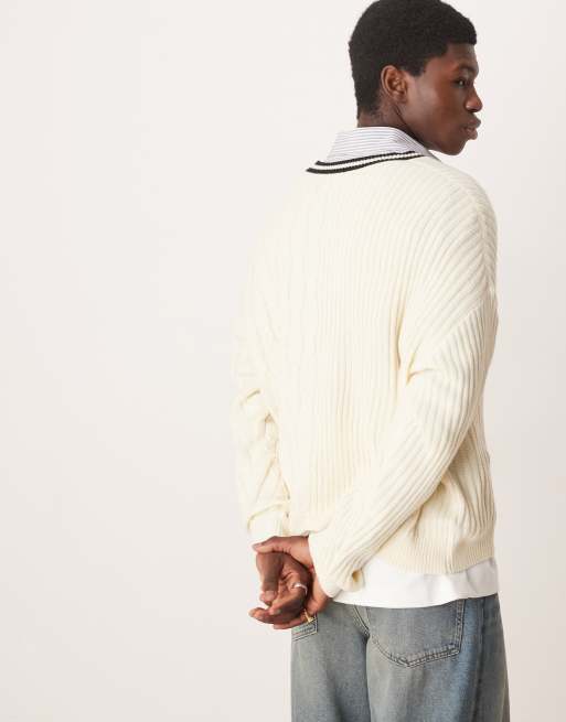 ASOS DESIGN oversized boxy fit contrast cable knit sweater with varsity badge in cream