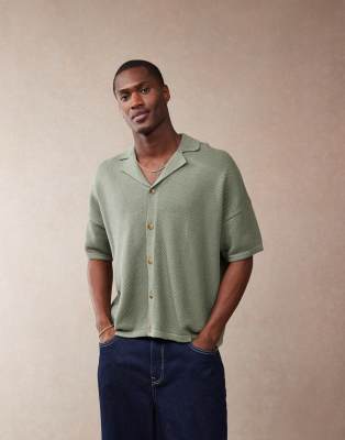 Asos Design Oversized Boxy Fit Knitted Texture Revere Neck Button Through Polo In Green