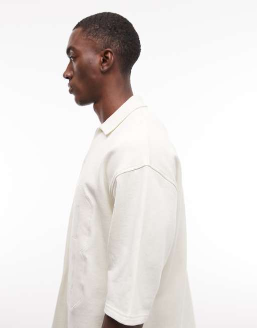 ASOS DESIGN oversized boxy fit polo shirt with appliqué detail in cream, 4 of 5