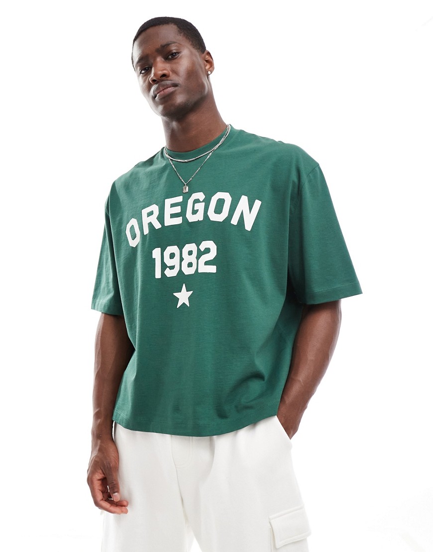 ASOS DESIGN oversized boxy fit t-shirt in dark green with Oregon front print and shoulder taping