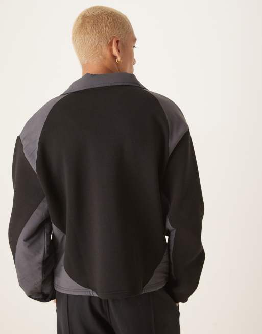 ASOS DESIGN oversized boxy jumper with contrast nylon panels in black fleece, 2 of 4