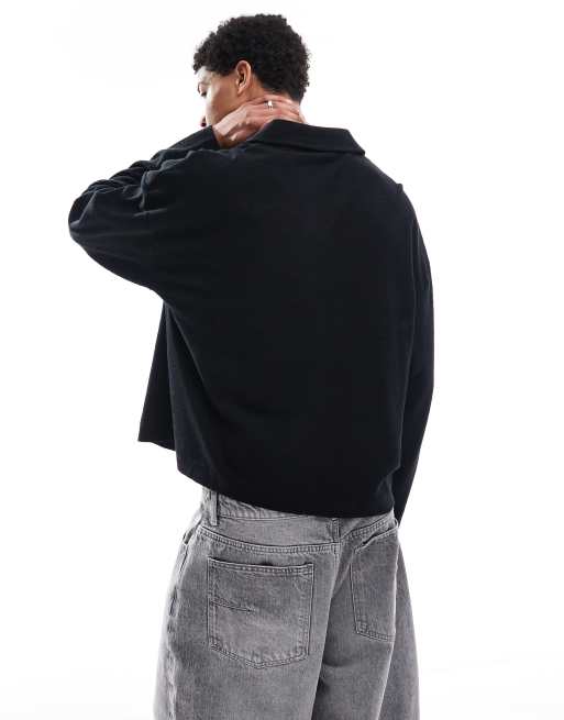 ASOS DESIGN oversized boxy long sleeve textured deep v neck polo shirt in black