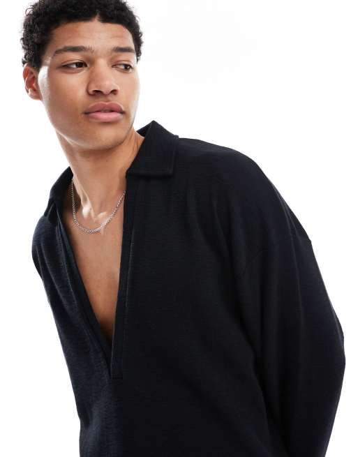 ASOS DESIGN oversized boxy long sleeve textured deep v neck polo shirt in black