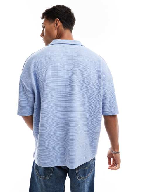 ASOS DESIGN oversized boxy polo in light blue