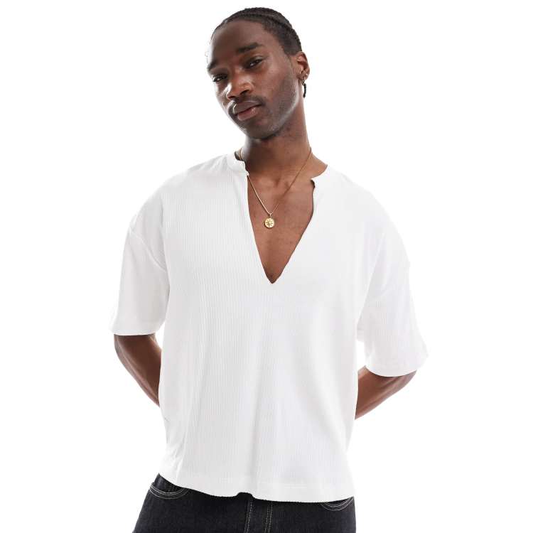 ASOS DESIGN oversized boxy ribbed T-shirt with deep cut V-neck in
