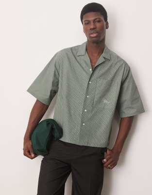 oversized boxy shirt with pocket embroidery in green stripe