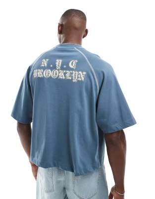 ASOS DESIGN - Oversized boxy T-shirt van zware stof met stadsprint op de achterkant in marineblauw