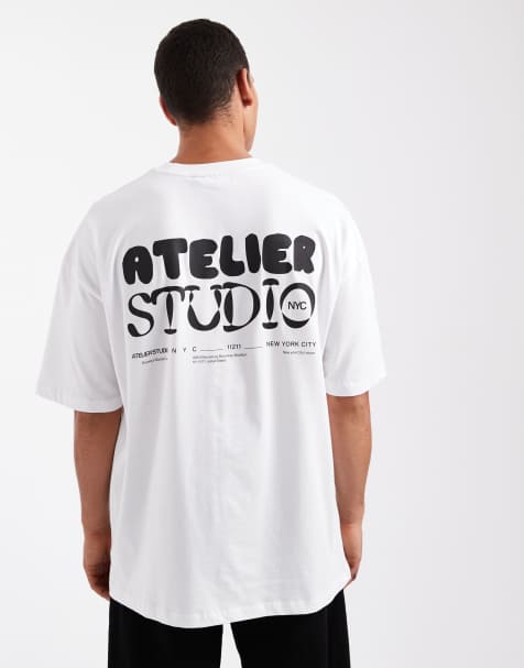 ASOS DESIGN oversized boxy T-shirt with atelier studio graphic in white - view 1