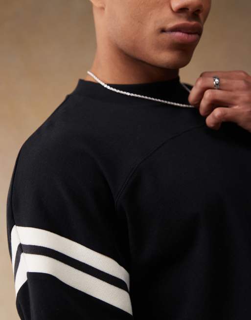 ASOS DESIGN oversized boxy t-shirt with white panelling in black