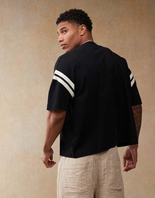 ASOS DESIGN oversized boxy t-shirt with white panelling in black