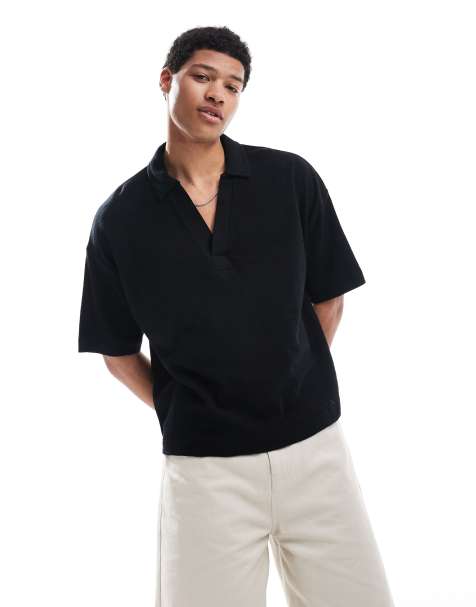 ASOS DESIGN oversized boxy textured revere collar polo shirt in black - view 1