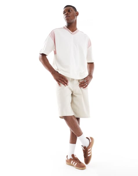 ASOS DESIGN oversized boxy v neck t-shirt with pink contrast panel in cream - view 1