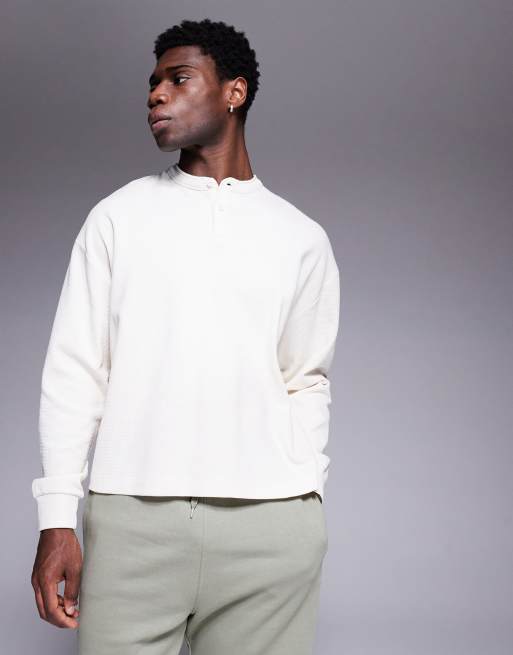 ASOS DESIGN oversized boxy waffle long sleeve t-shirt with henley neck in cream