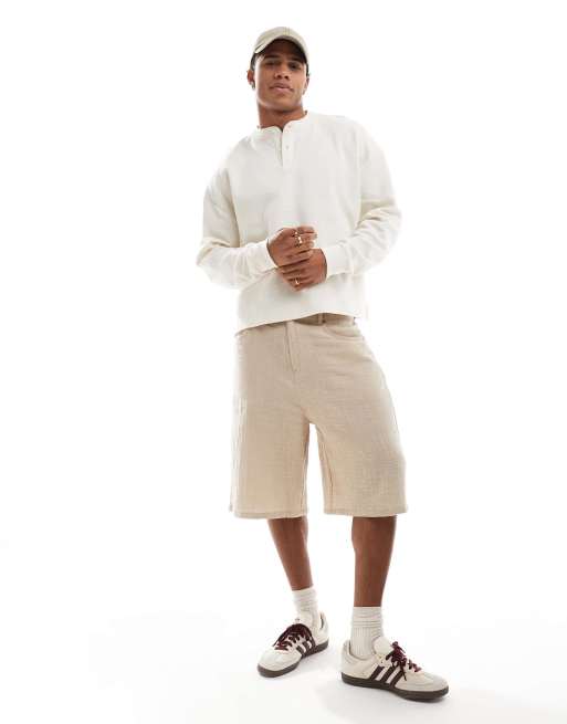 ASOS DESIGN oversized boxy waffle long sleeve T-shirt with henley neck in cream
