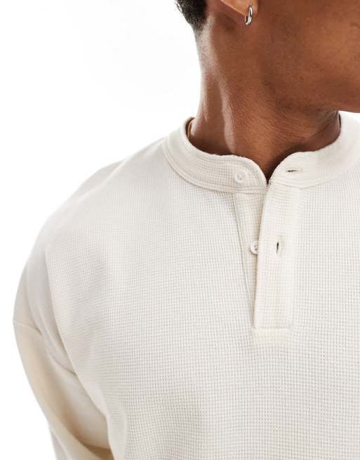 ASOS DESIGN oversized boxy waffle long sleeve T-shirt with henley neck in cream