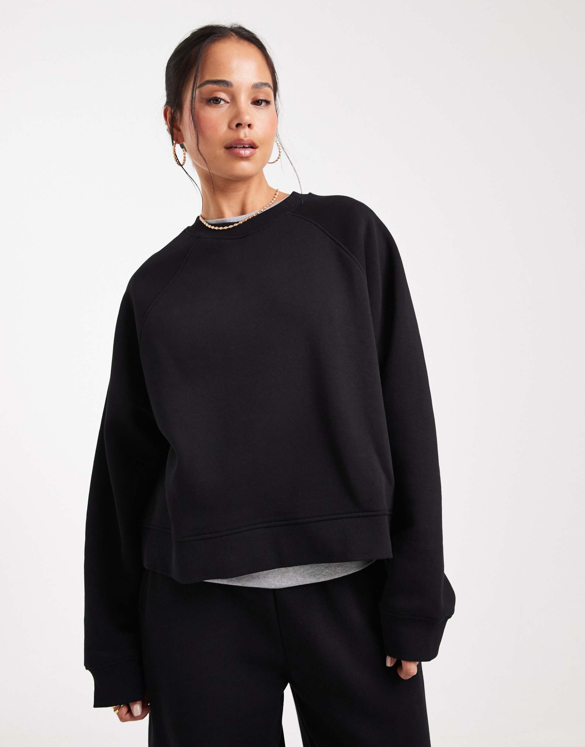asos design oversized brushback sweatshirt with raglan detail in black