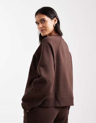 Asos Design Oversized Brushback Sweatshirt With Raglan Detail In Animal Print