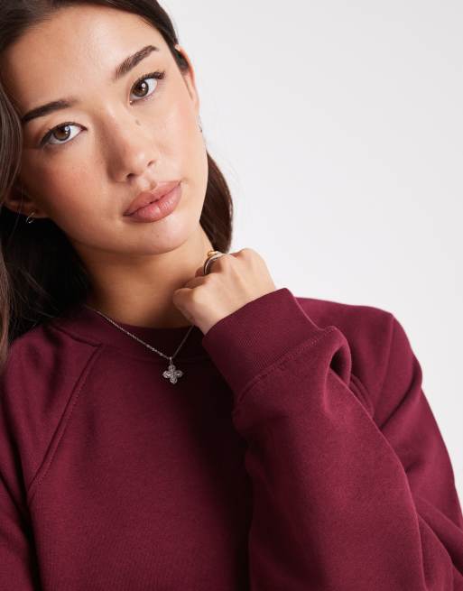 ASOS DESIGN oversized brushback sweatshirt with raglan detailing in burgundy