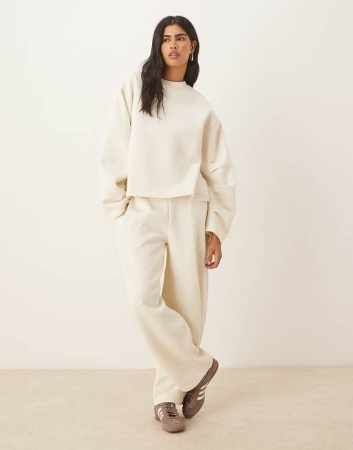 ASOS DESIGN oversized brushback sweatshirt with ruched sleeve detailing in cream