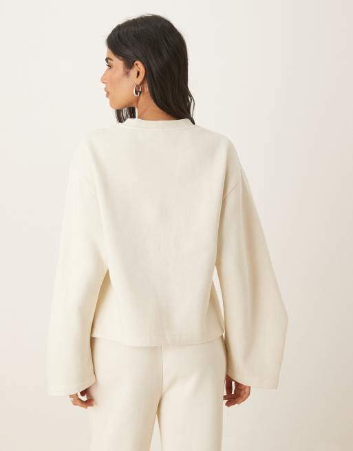 ASOS DESIGN oversized brushback sweatshirt with ruched sleeve detailing in cream