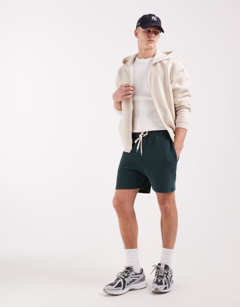ASOS DESIGN oversized bubble herringbone jersey shorts in dark green - view 1