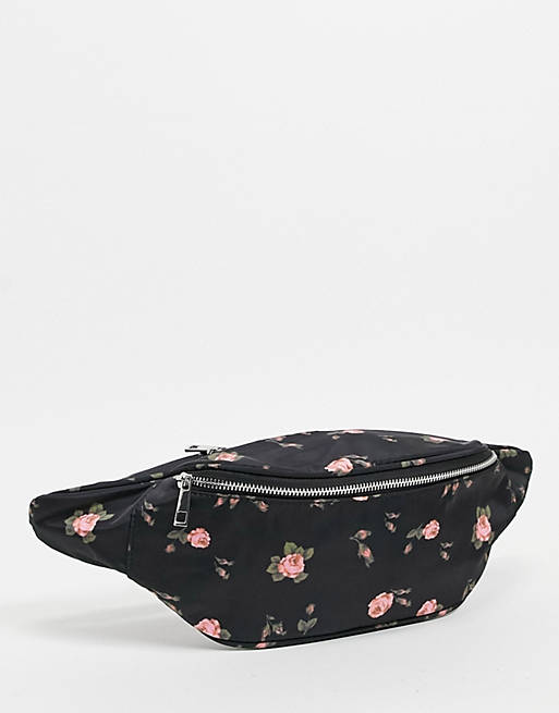 ASOS DESIGN oversized bum bag in ditsy floral print