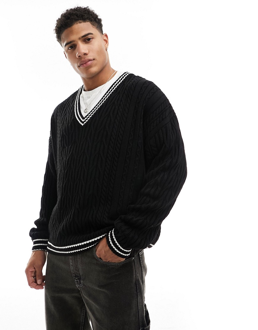 ASOS DESIGN oversized cable knit cricket jumper in black with white tipping