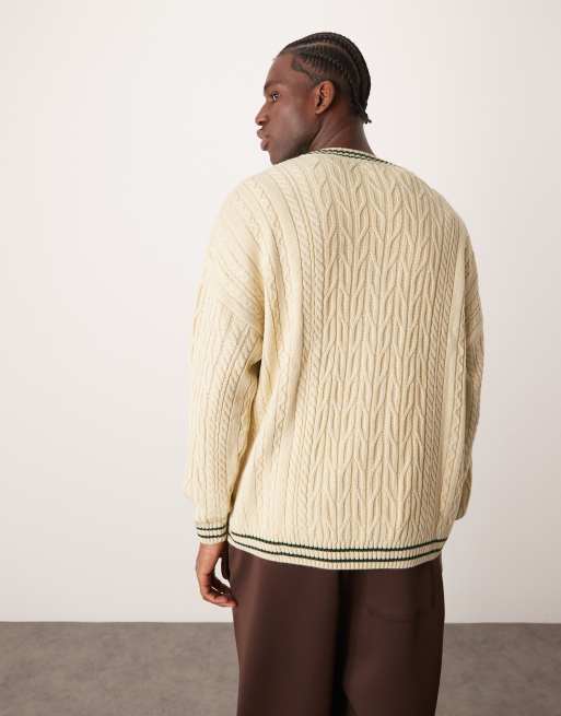 ASOS DESIGN oversized cable knit cricket jumper in cream with green tipping ASOS