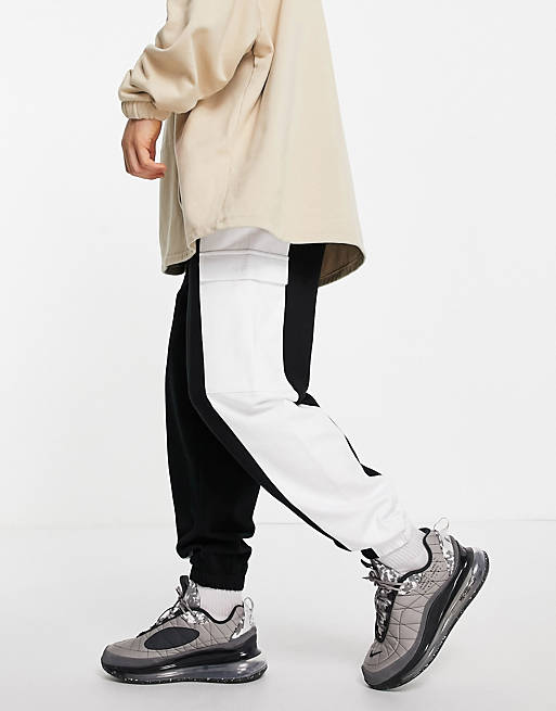 Men oversized cargo joggers in black and white colour block 