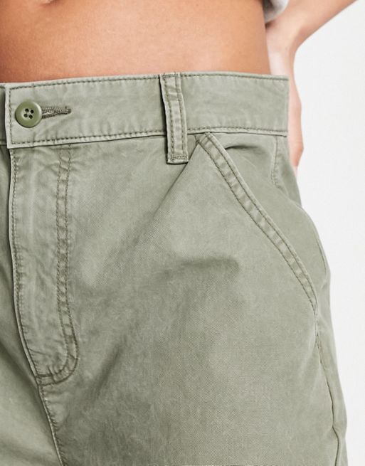 ASOS DESIGN ultra flare cargo pants in khaki sulphur wash