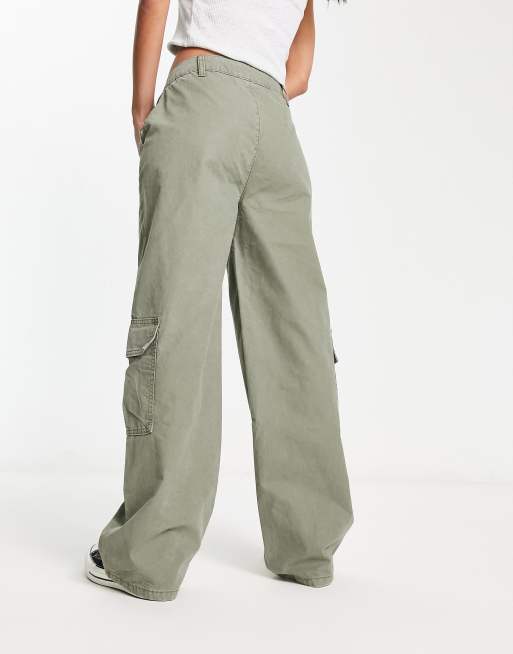 ASOS DESIGN ultra flare cargo pants in khaki sulphur wash