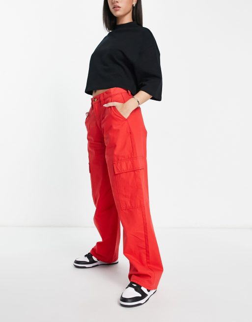 ASOS DESIGN roll waist oversized sweatpants with tennis logo in red