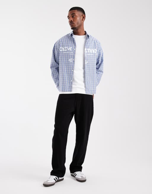 .ASOS DESIGN oversized check shirt with chest print in blue, 2 of 5