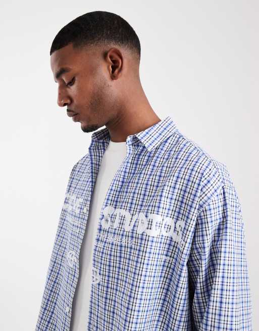 .ASOS DESIGN oversized check shirt with chest print in blue, 3 of 5