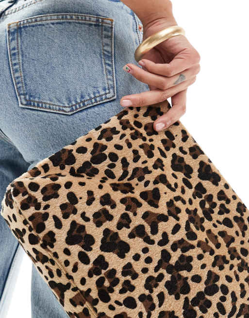 ASOS DESIGN oversized clutch bag in leopard print ASOS