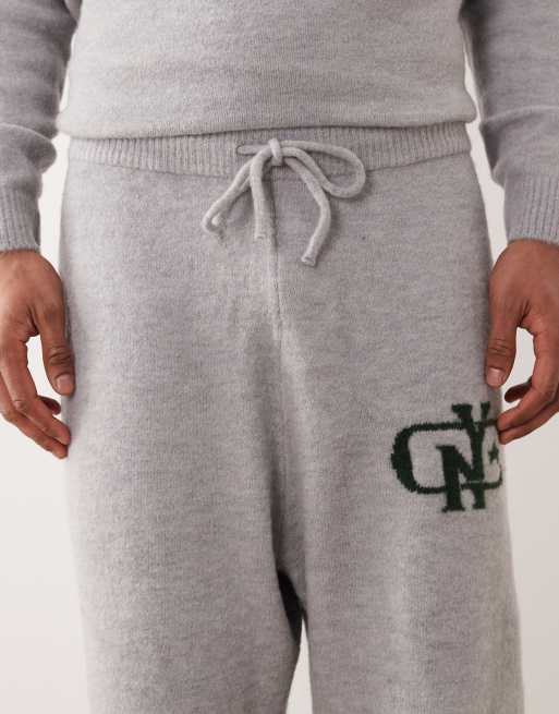 ASOS DESIGN oversized co-ord knitted cuffed joggers with NYC chest logo in washed grey, 5 of 5