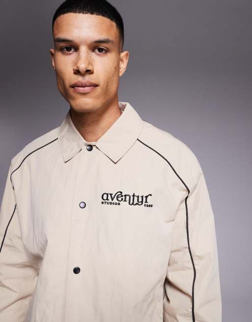 ASOS DESIGN oversized coach jacket with embroidery in stone