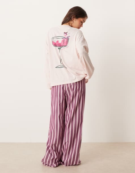 ASOS DESIGN oversized cocktail print long sleeve tee & woven wide leg trouser pyjama set in pink stripe - view 1