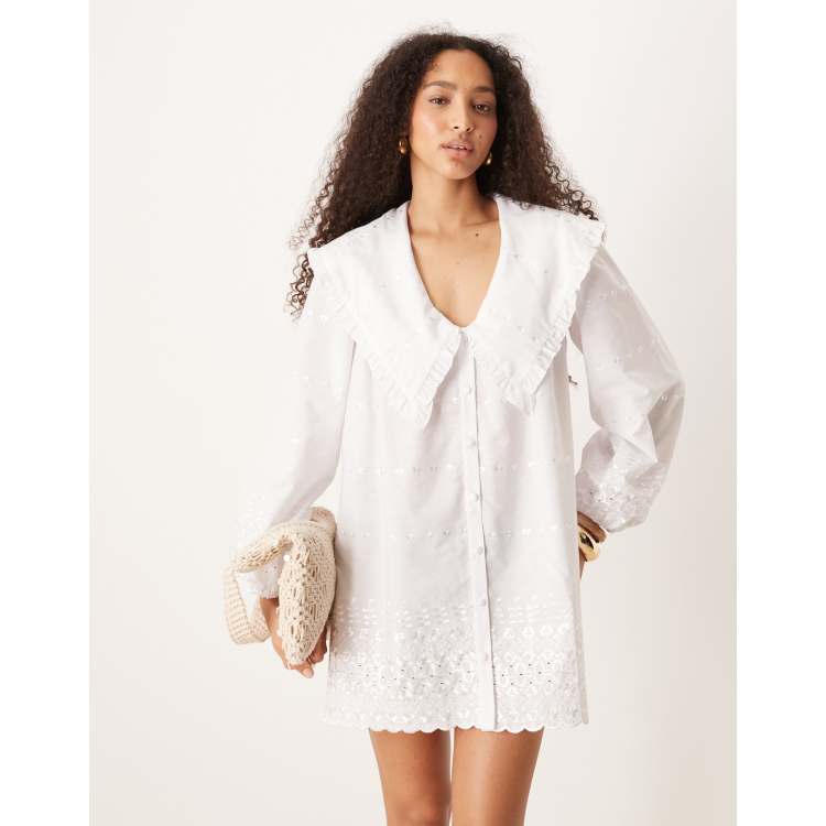 asos shirt dress DESIGN oversized collar long sleeve mini in white The delicate lace trim adds a touch of femininity Shop Shirt Dresses, Oversized Shirt