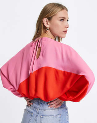 ASOS DESIGN oversized color block top with long sleeve in pink & red