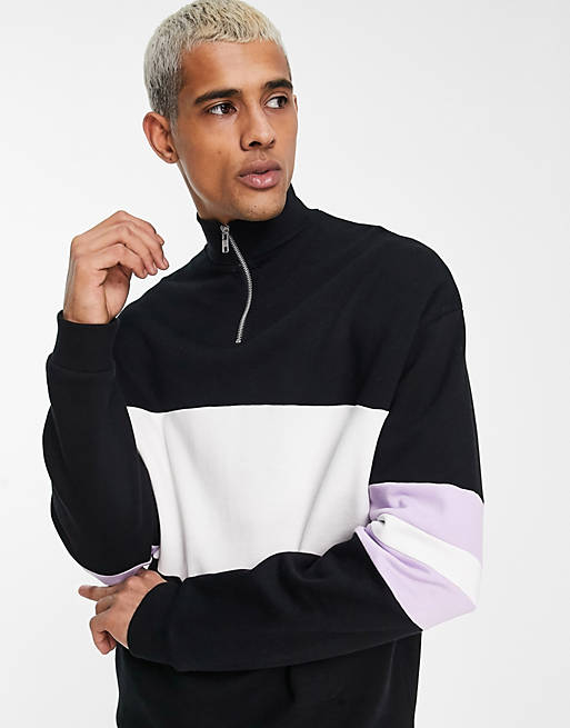 ASOS DESIGN oversized colour block half zip sweatshirt in black and ...