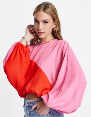 ASOS DESIGN oversized colourblock top with long sleeve in pink & red