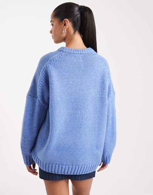 ASOS DESIGN oversized crew neck jumper with curved hem in blue