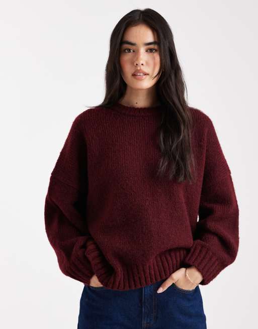 ASOS DESIGN oversized crew neck jumper with curved hem in burgundy
