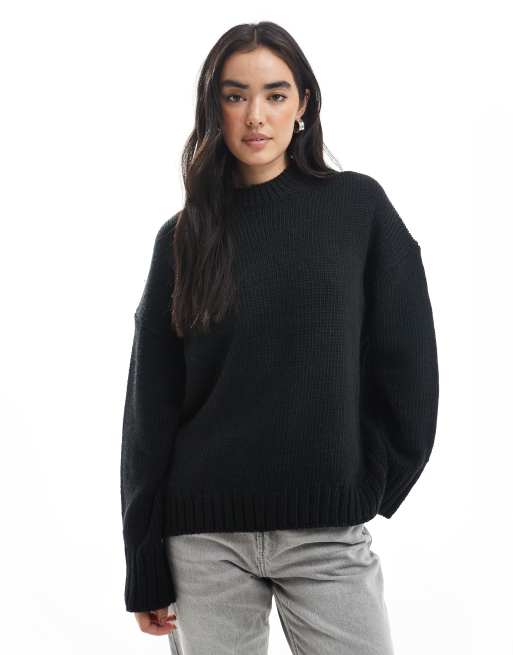 ASOS DESIGN oversized crew neck jumper with curved hem in clean yarn in black