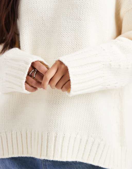 ASOS DESIGN oversized crew neck jumper with curved hem in clean yarn in cream