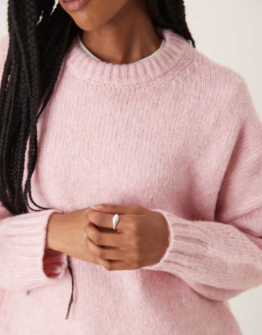 ASOS DESIGN oversized crew neck jumper with curved hem in pink