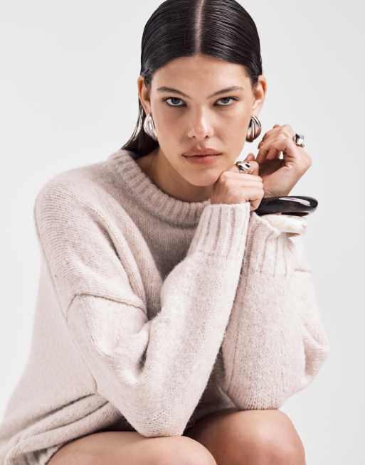 ASOS DESIGN oversized crew neck sweater with curved hem in cream