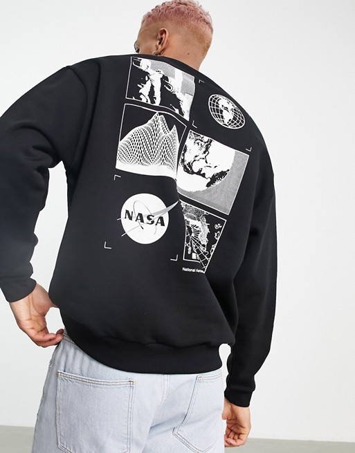 ASOS DESIGN oversized crew neck sweatshirt with Nasa prints in black