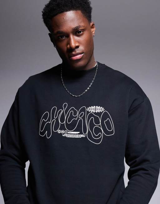 ASOS DESIGN oversized crew sweat with city print in black
